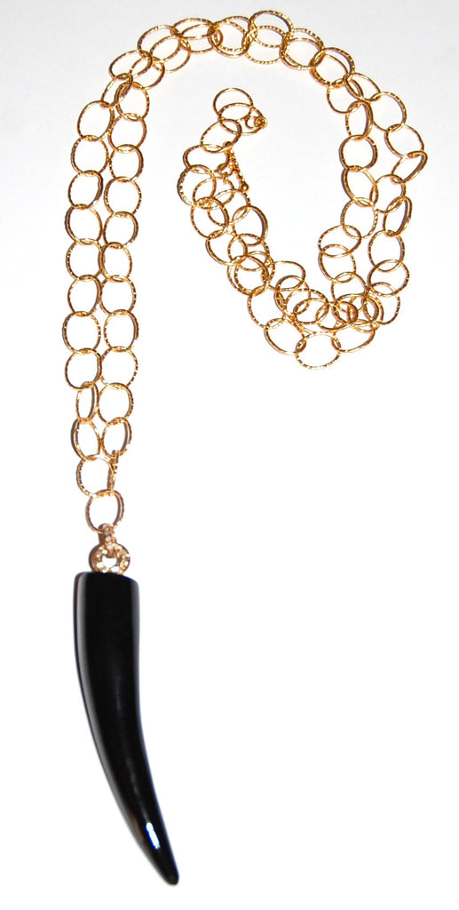 Black onyx tusk with flush diamond necklace