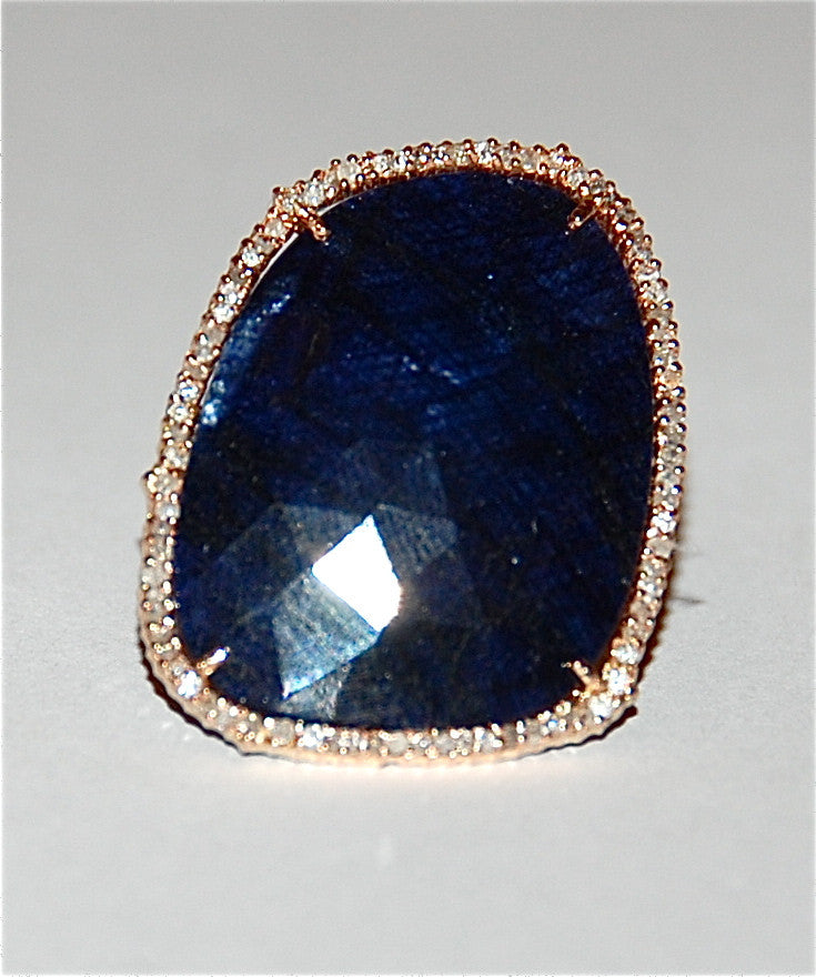 Sapphire with pave diamond ring