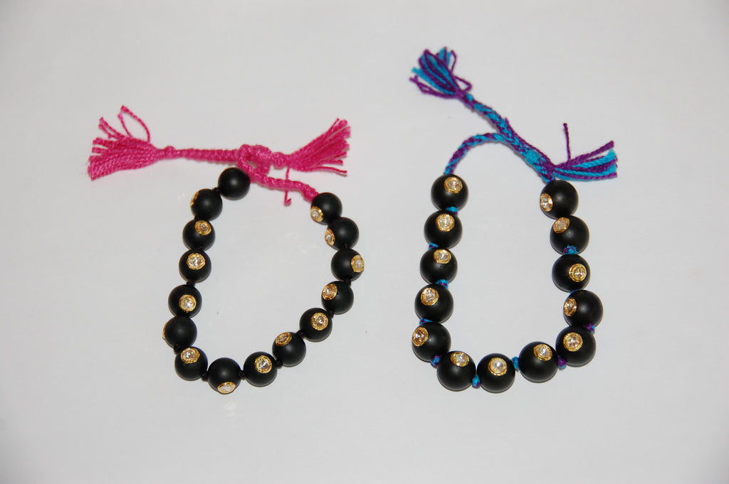 Mat black onyx bead with 15 Polki diamonds bracelet