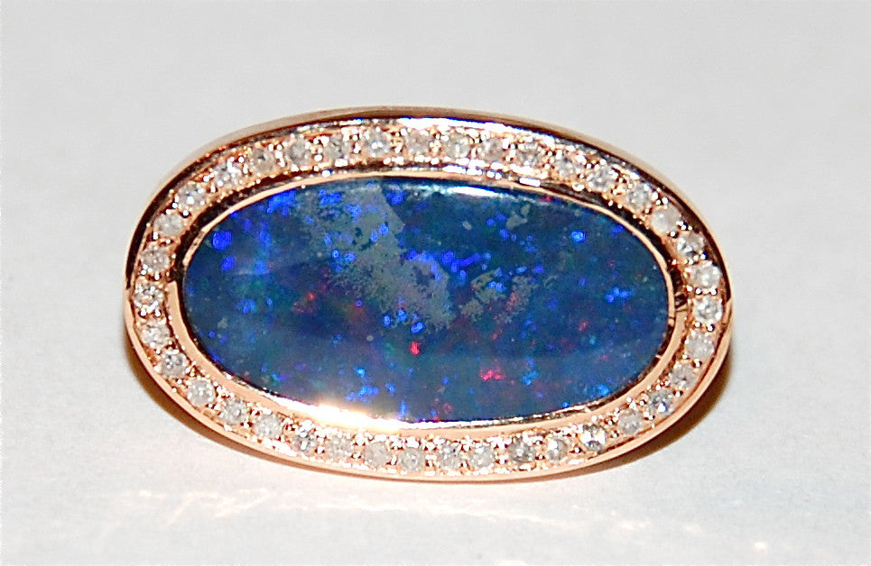 Opal with paved diamond ring