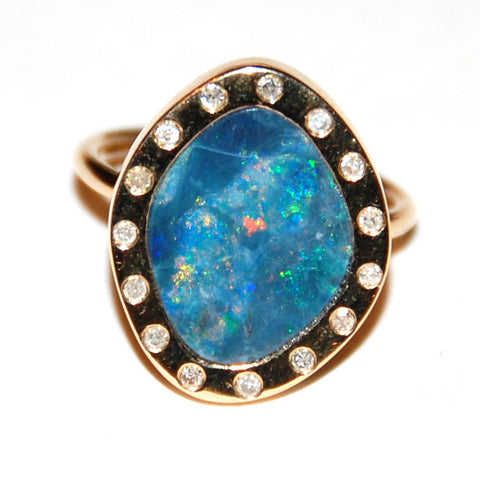 Opal with flush diamond ring